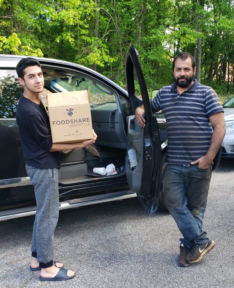 Mill Community delivering food as part of their expanded FoodShare program